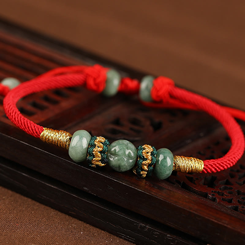Bracelet en corde rouge avec perles de boulier en jade et Buddha Stones