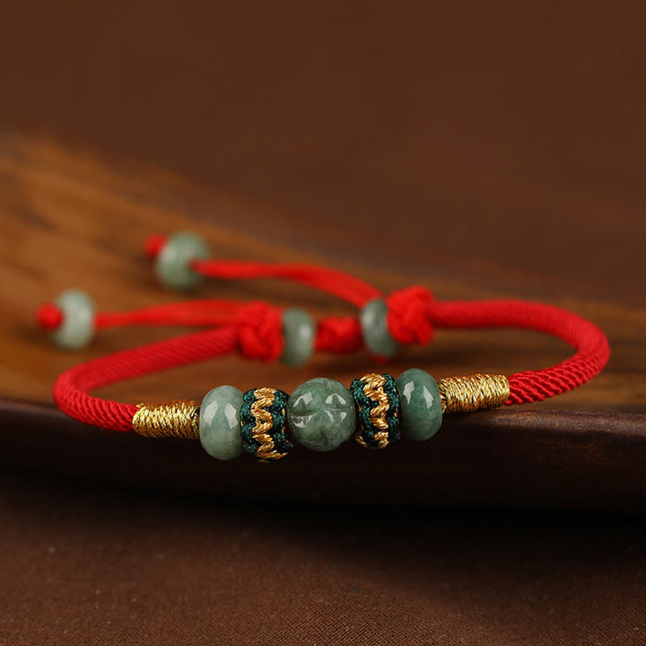Bracelet en corde rouge avec perles de boulier en jade et Buddha Stones