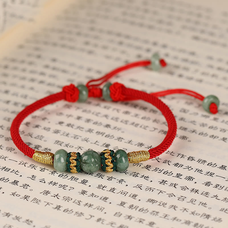 Bracelet en corde rouge avec perles de boulier en jade et Buddha Stones
