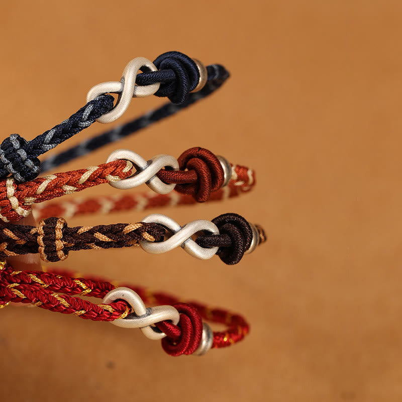 Bracelet en corde porte-bonheur en argent sterling 999 fait à la main avec des Buddha Stones et un symbole de l'infini sans fin