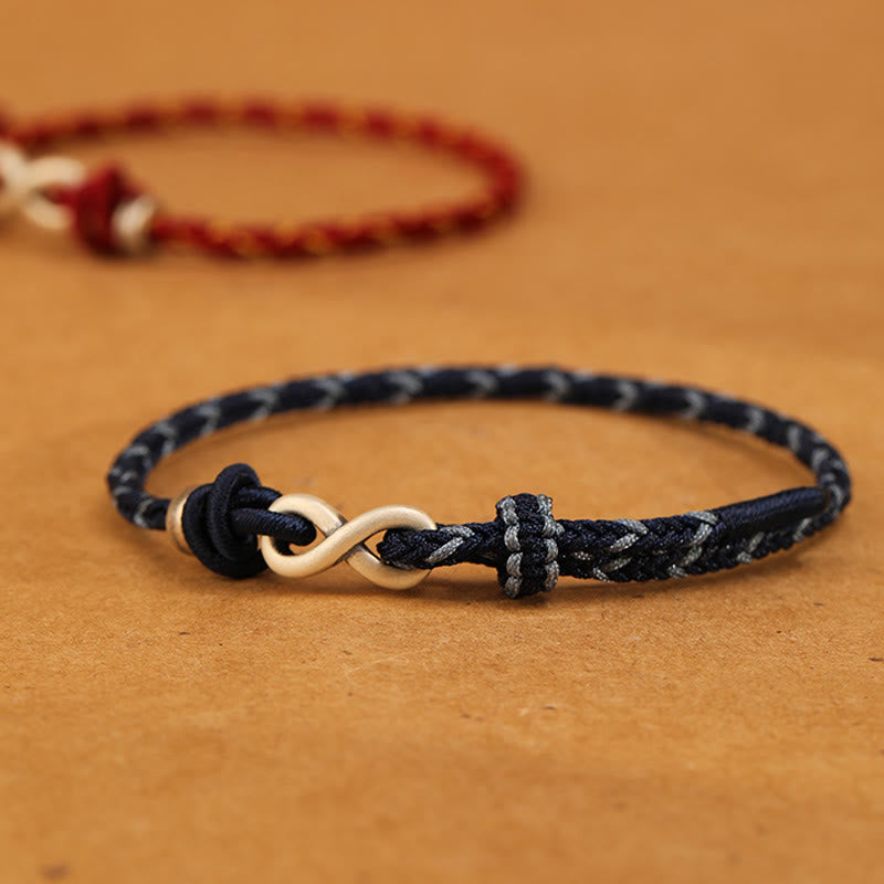 Bracelet en corde porte-bonheur en argent sterling 999 fait à la main avec des Buddha Stones et un symbole de l'infini sans fin