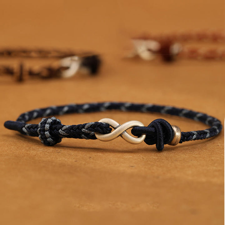 Bracelet en corde porte-bonheur en argent sterling 999 fait à la main avec des Buddha Stones et un symbole de l'infini sans fin