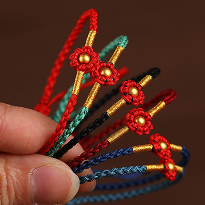 Bracelet en corde de protection porte-bonheur fait main en mini perles en or 999 avec motif floral et Buddha Stones