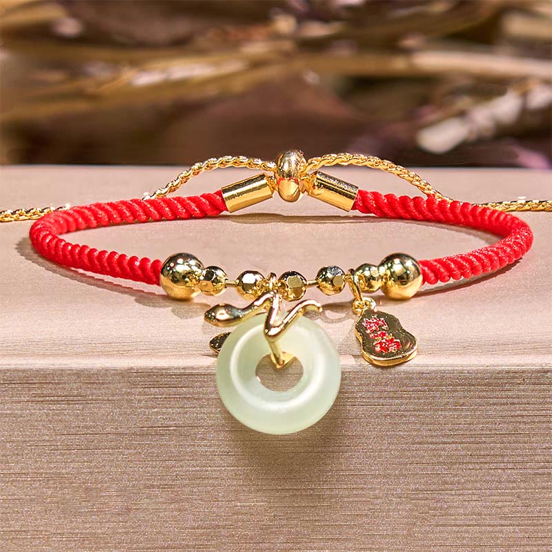 Bracelet porte-bonheur en fil rouge avec boucle de paix en jade plaqué or et cuivre avec Buddha Stones et personnage Fu Année du serpent - image 1