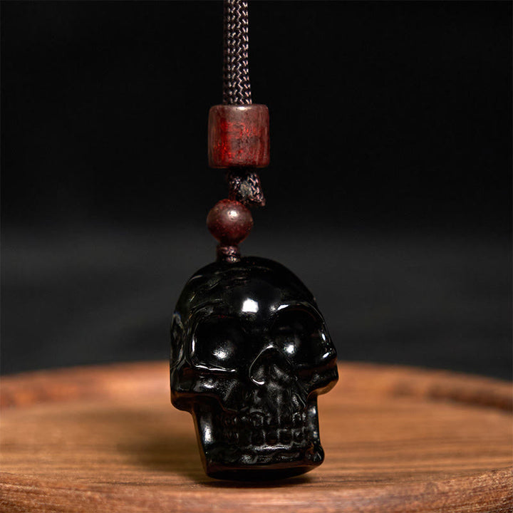 Collier pendentif en obsidienne noire avec Buddha Stones et squelette Shmashana