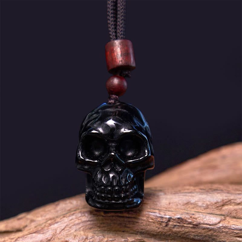 Collier pendentif en obsidienne noire avec Buddha Stones et squelette Shmashana