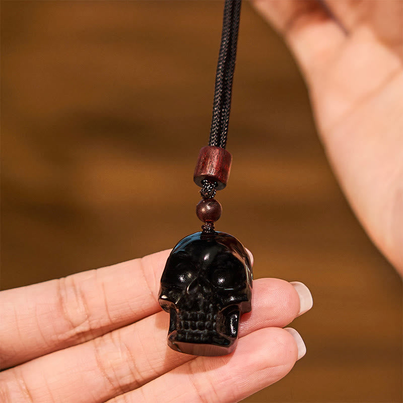 Collier pendentif en obsidienne noire avec Buddha Stones et squelette Shmashana