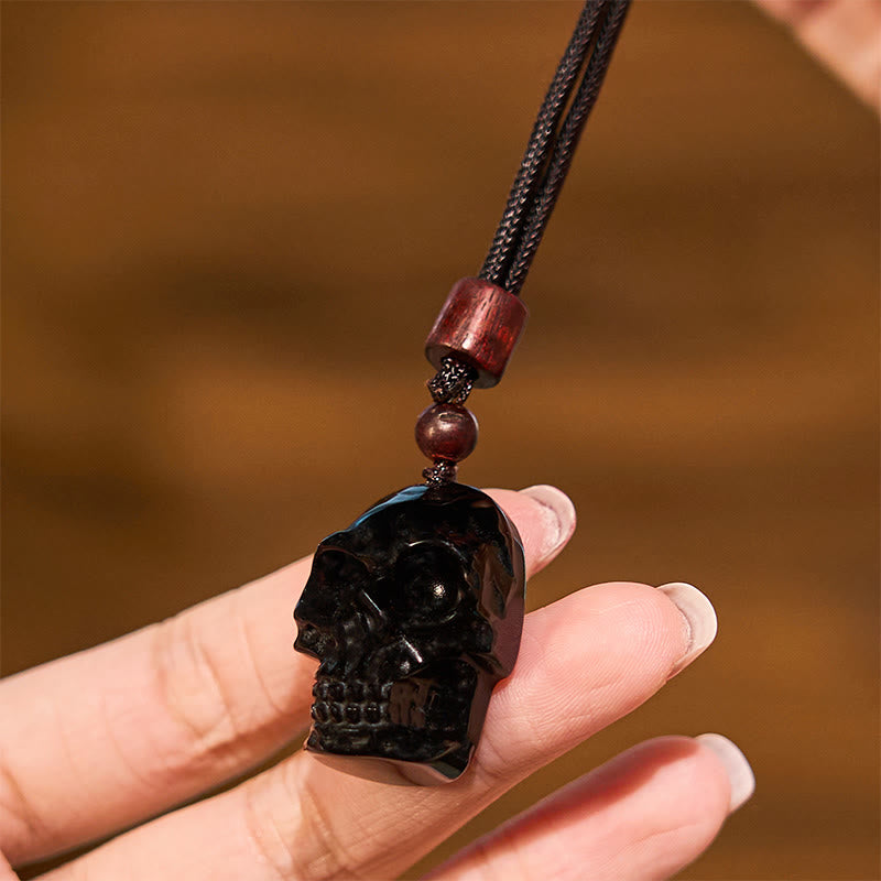 Collier pendentif en obsidienne noire avec Buddha Stones et squelette Shmashana