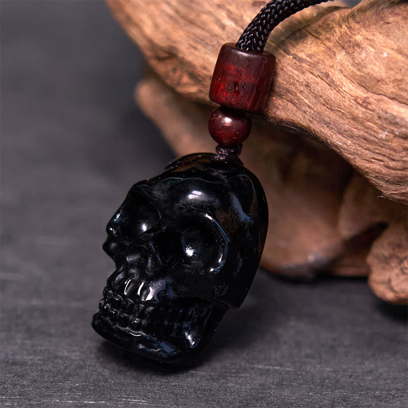 Collier pendentif en obsidienne noire avec Buddha Stones et squelette Shmashana