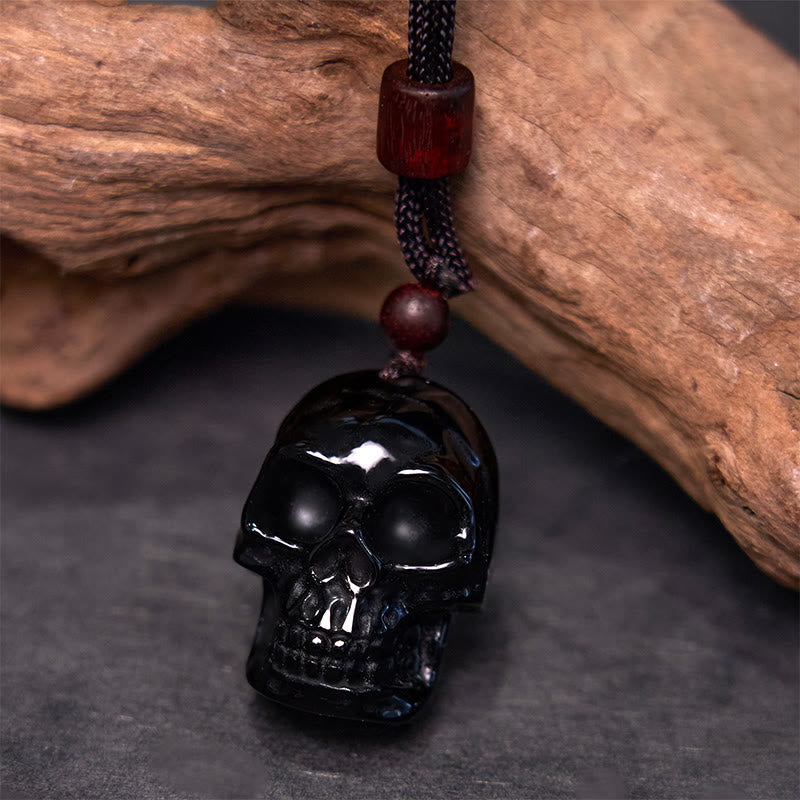 Collier pendentif en obsidienne noire avec Buddha Stones et squelette Shmashana
