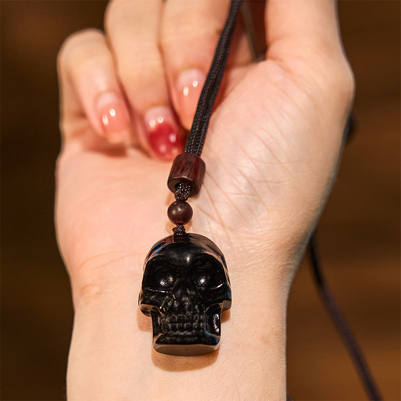 Collier pendentif en obsidienne noire avec Buddha Stones et squelette Shmashana
