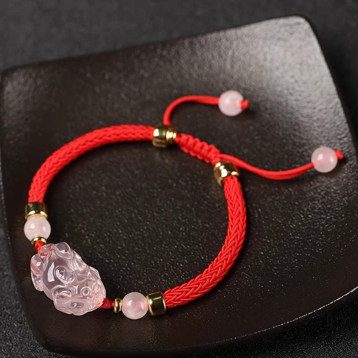 Bracelet tressé en cristal rose PiXiu de Buddha Stones