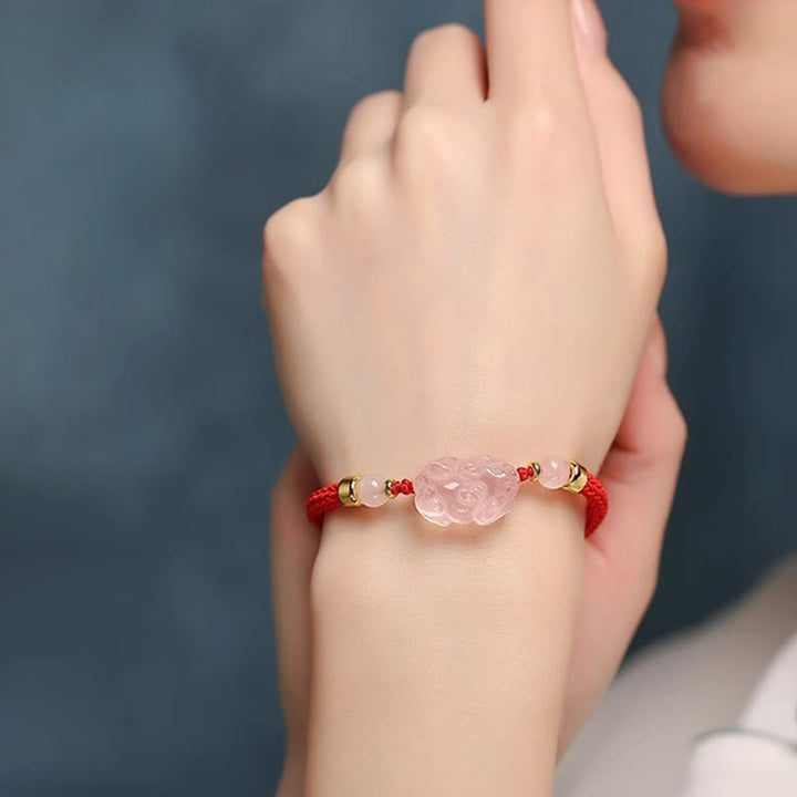 Bracelet tressé en cristal rose PiXiu de Buddha Stones