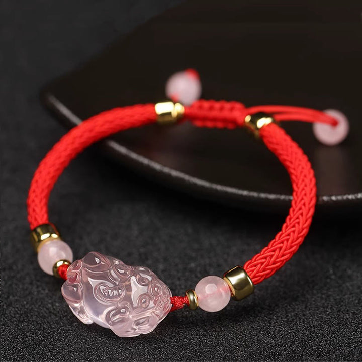 Bracelet tressé en cristal rose PiXiu de Buddha Stones