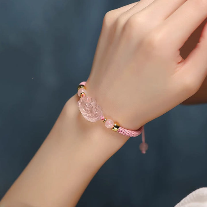 Bracelet tressé en cristal rose PiXiu de Buddha Stones