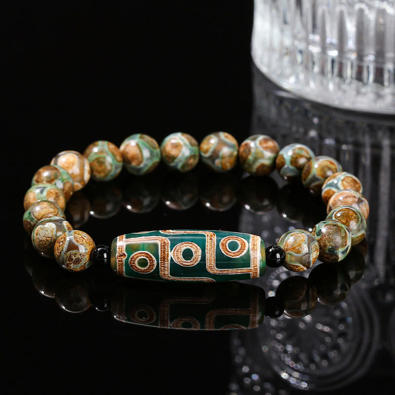 Bracelet de protection et de pouvoir en agate œil de chat blanche et bois de santal naturel avec Buddha Stones tibétaines à neuf yeux Dzi