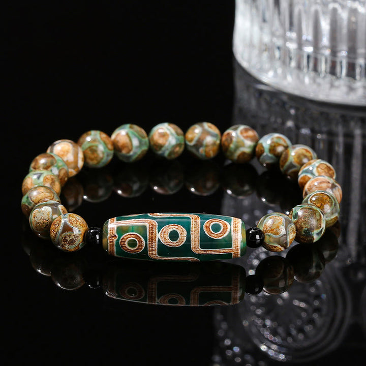 Bracelet de protection et de pouvoir en agate œil de chat blanche et bois de santal naturel avec Buddha Stones tibétaines à neuf yeux Dzi