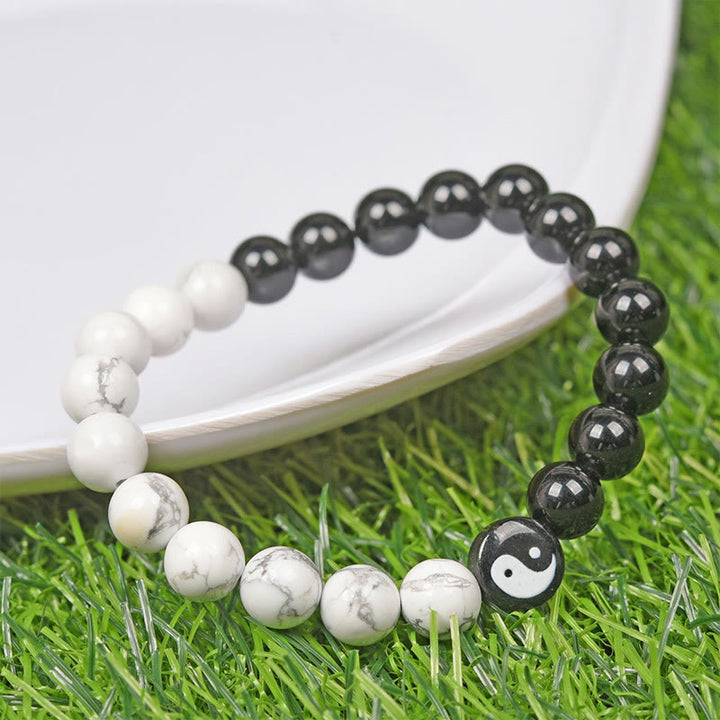 Bracelet de force Yinyang Tai Chi en obsidienne naturelle et turquoise blanche en Buddha Stones