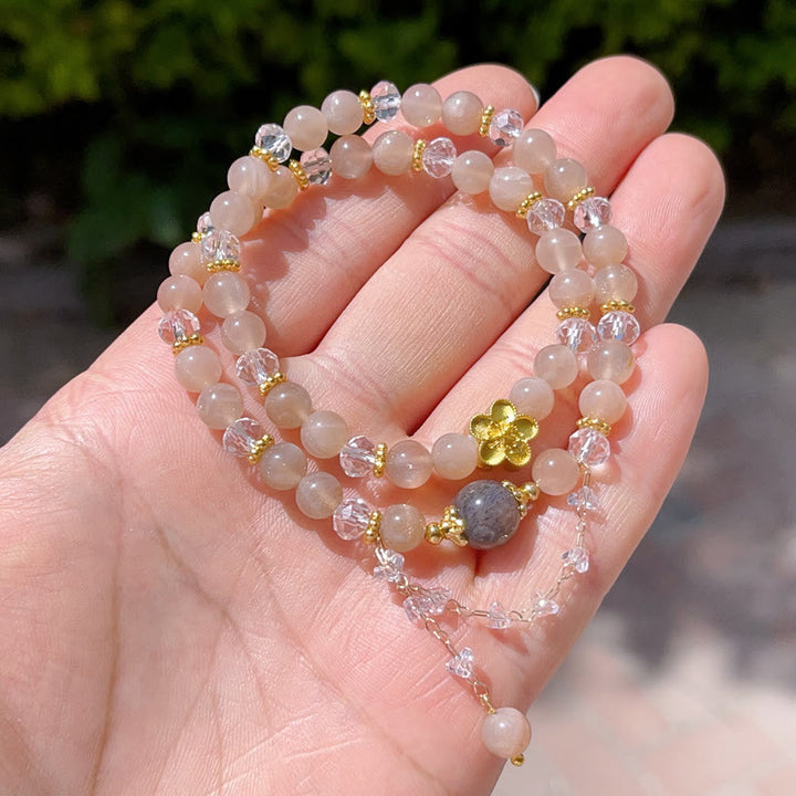 Bracelet double tour en cristal de pierre de soleil et de fleur de pêcher de Buddha Stones