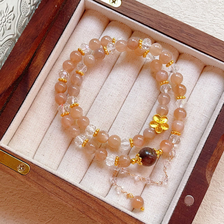 Bracelet double tour en cristal de pierre de soleil et de fleur de pêcher de Buddha Stones