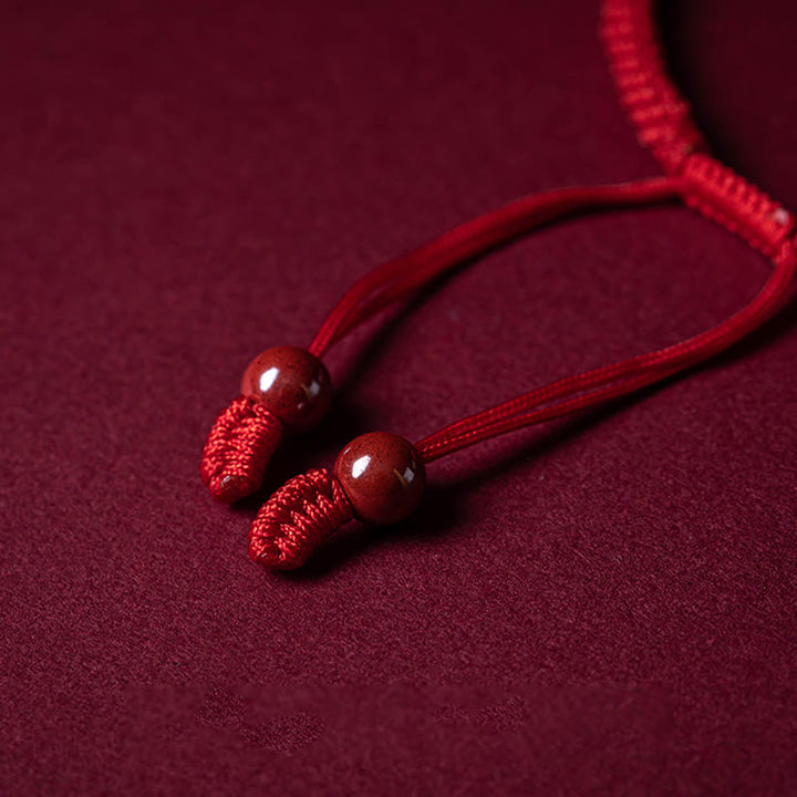 Bracelet tressé en corde rouge avec poignée en cinabre Ruyi et personnage Fu PiXiu fait à la main en Buddha Stones - image 12