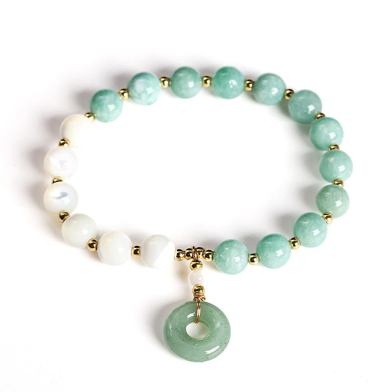 Bracelet d'abondance avec breloque en forme de boucle de paix , Buddha Stones , jade, trochus, fer à cheval, escargot