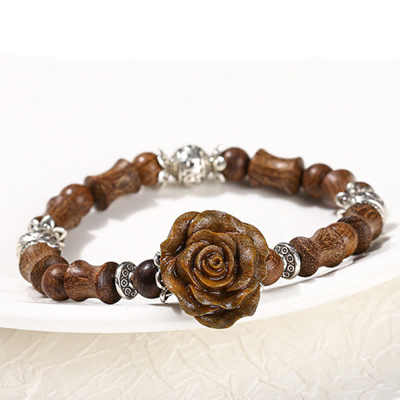 Bracelet de guérison camélia en bois de santal et bambou avec Buddha Stones