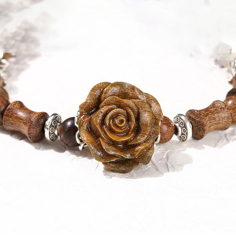 Bracelet de guérison camélia en bois de santal et bambou avec Buddha Stones