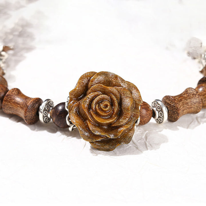 Bracelet de guérison camélia en bois de santal et bambou avec Buddha Stones