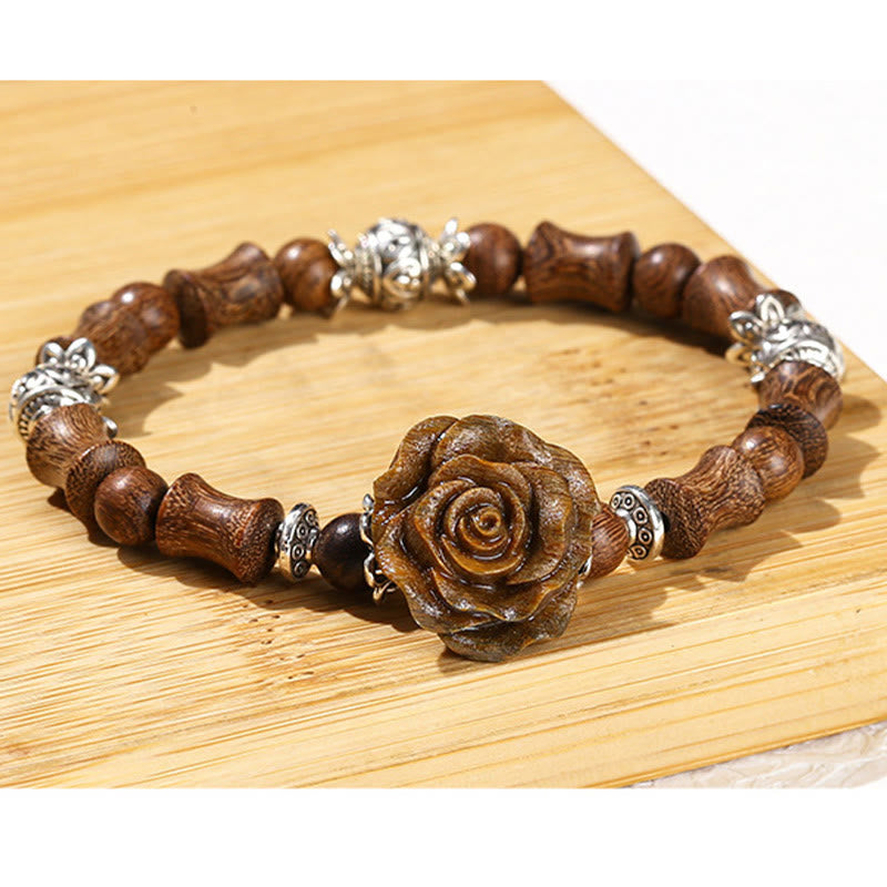 Bracelet de guérison camélia en bois de santal et bambou avec Buddha Stones