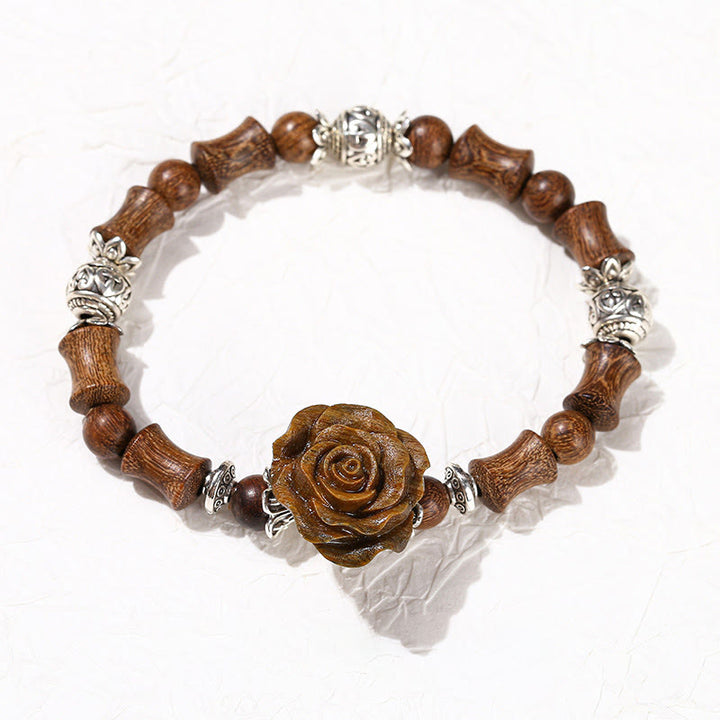 Bracelet de guérison camélia en bois de santal et bambou avec Buddha Stones