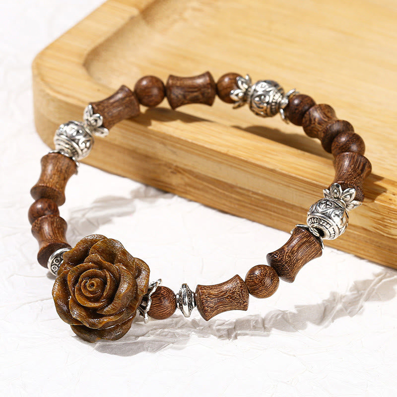 Bracelet de guérison camélia en bois de santal et bambou avec Buddha Stones