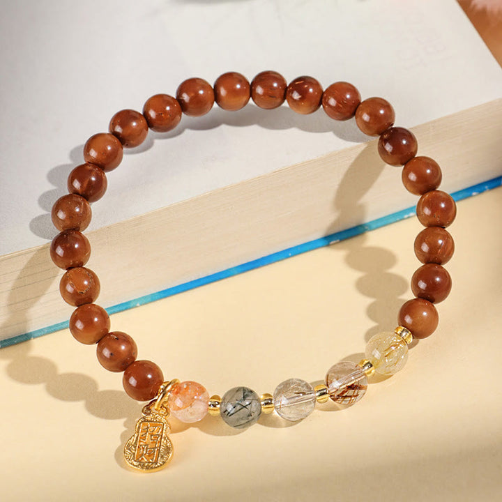 Bracelet en cristal Super Seven en quartz rutile et citrine fantôme verte Buddha Stones pour attirer la confiance et la richesse