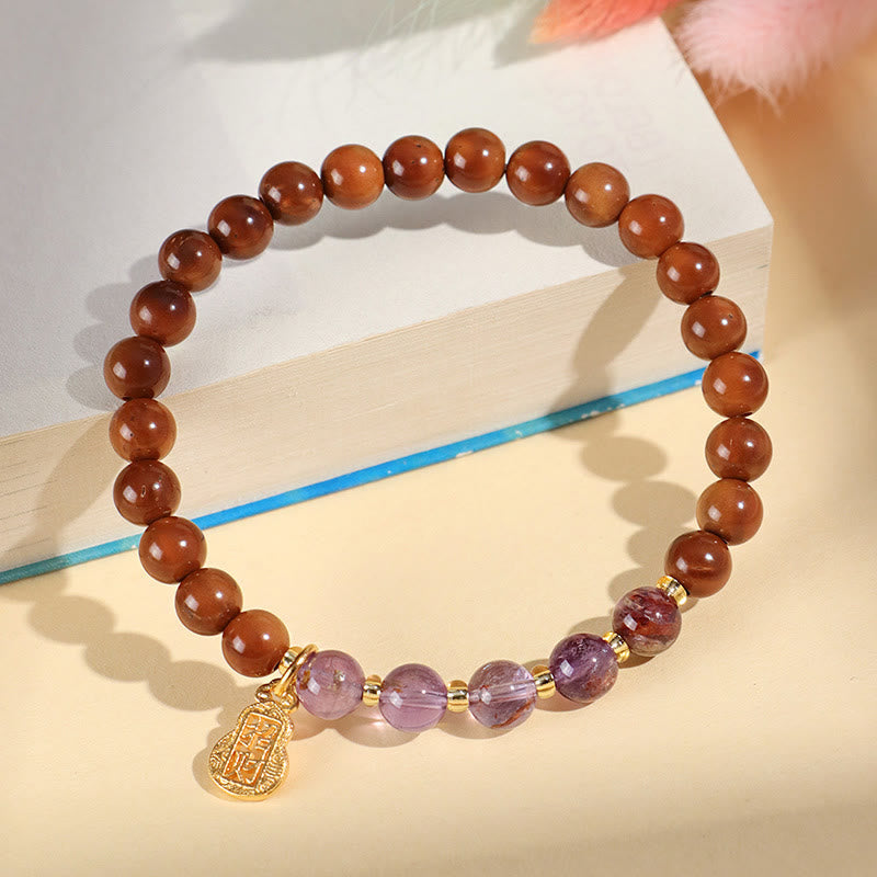 Bracelet en cristal Super Seven en quartz rutile et citrine fantôme verte Buddha Stones pour attirer la confiance et la richesse