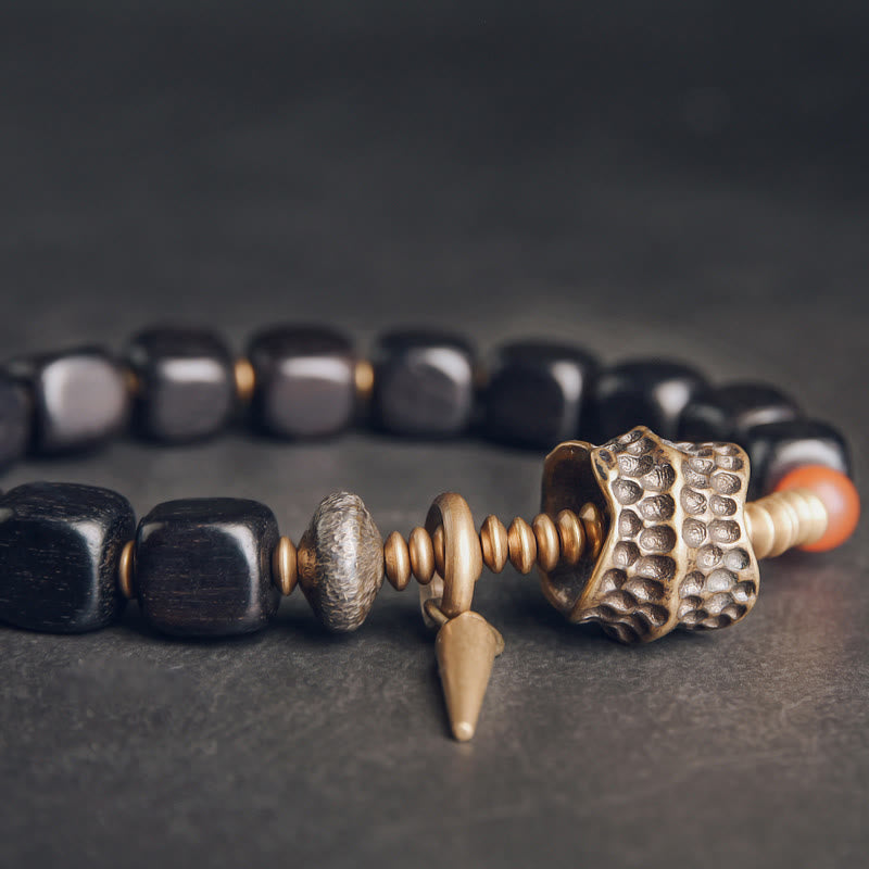Bracelet de paix en Buddha Stones, bois d'ébène, cuivre, laiton, agate rouge