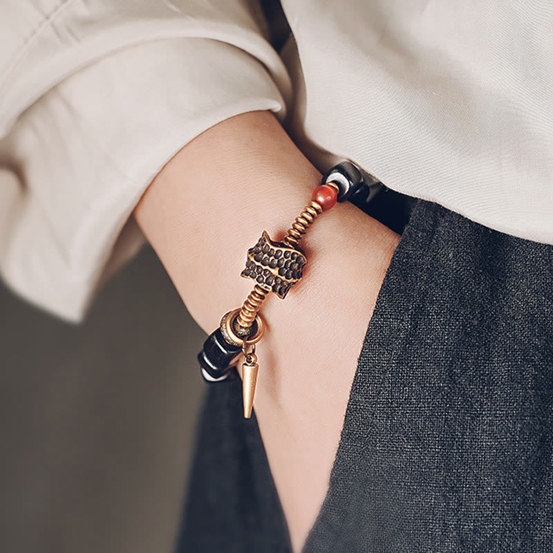 Bracelet de paix en Buddha Stones, bois d'ébène, cuivre, laiton, agate rouge
