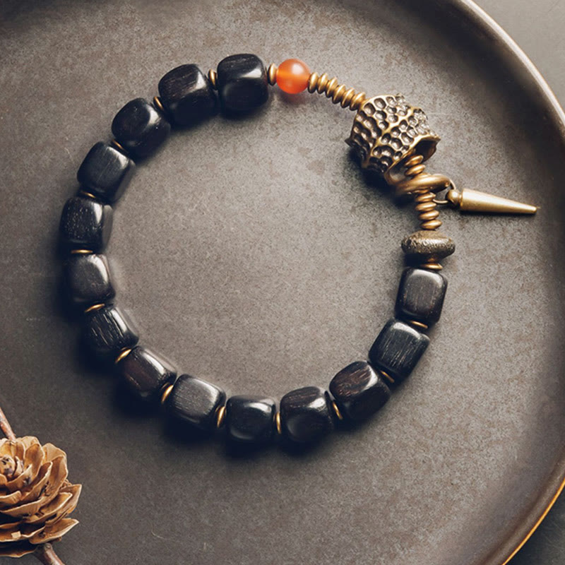 Bracelet de paix en Buddha Stones, bois d'ébène, cuivre, laiton, agate rouge