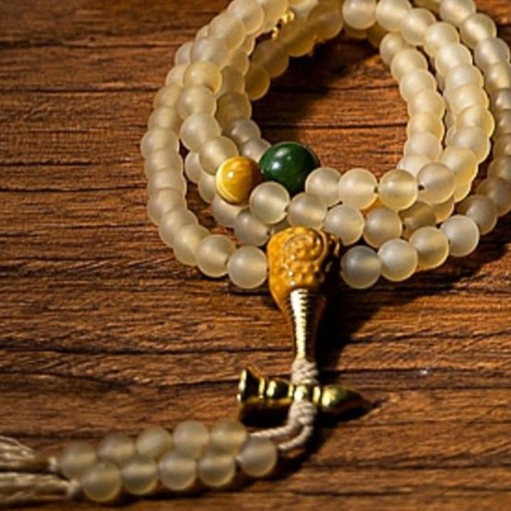 Bracelet de richesse en corne de mouton naturelle Bouddha du zodiaque chinois avec 108 perles de Mala en Buddha Stones du Tibet