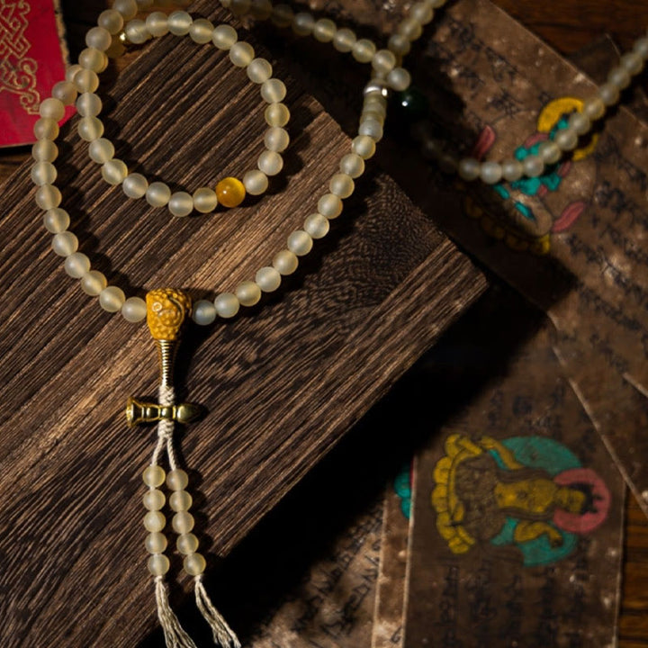 Bracelet de richesse en corne de mouton naturelle Bouddha du zodiaque chinois avec 108 perles de Mala en Buddha Stones du Tibet