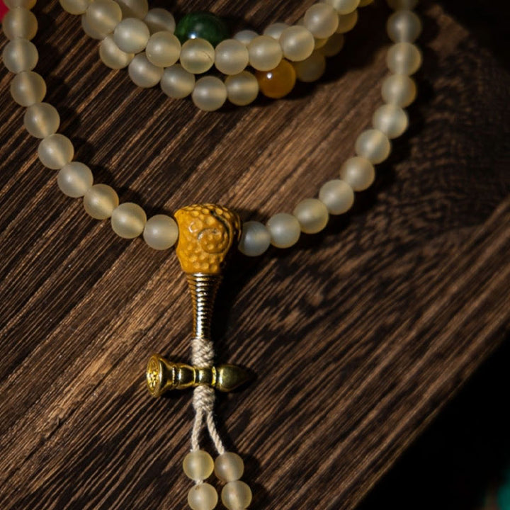 Bracelet de richesse en corne de mouton naturelle Bouddha du zodiaque chinois avec 108 perles de Mala en Buddha Stones du Tibet