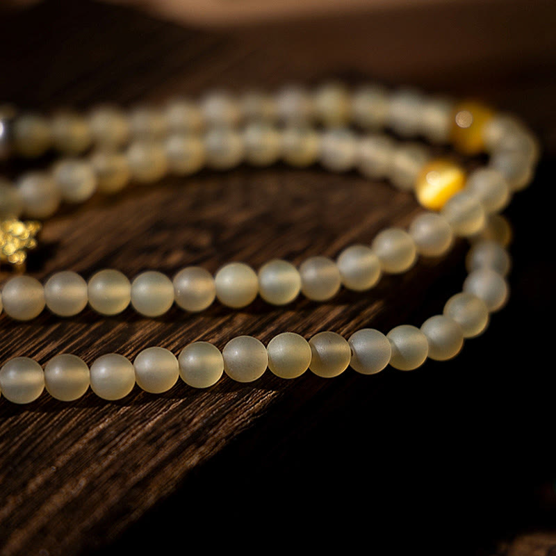 Bracelet de richesse en corne de mouton naturelle Bouddha du zodiaque chinois avec 108 perles de Mala en Buddha Stones du Tibet