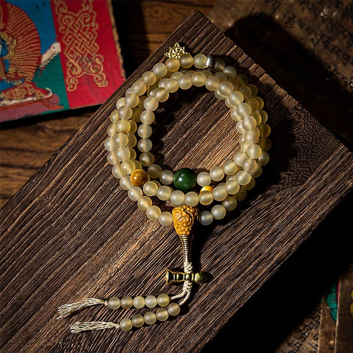 Bracelet de richesse en corne de mouton naturelle Bouddha du zodiaque chinois avec 108 perles de Mala en Buddha Stones du Tibet
