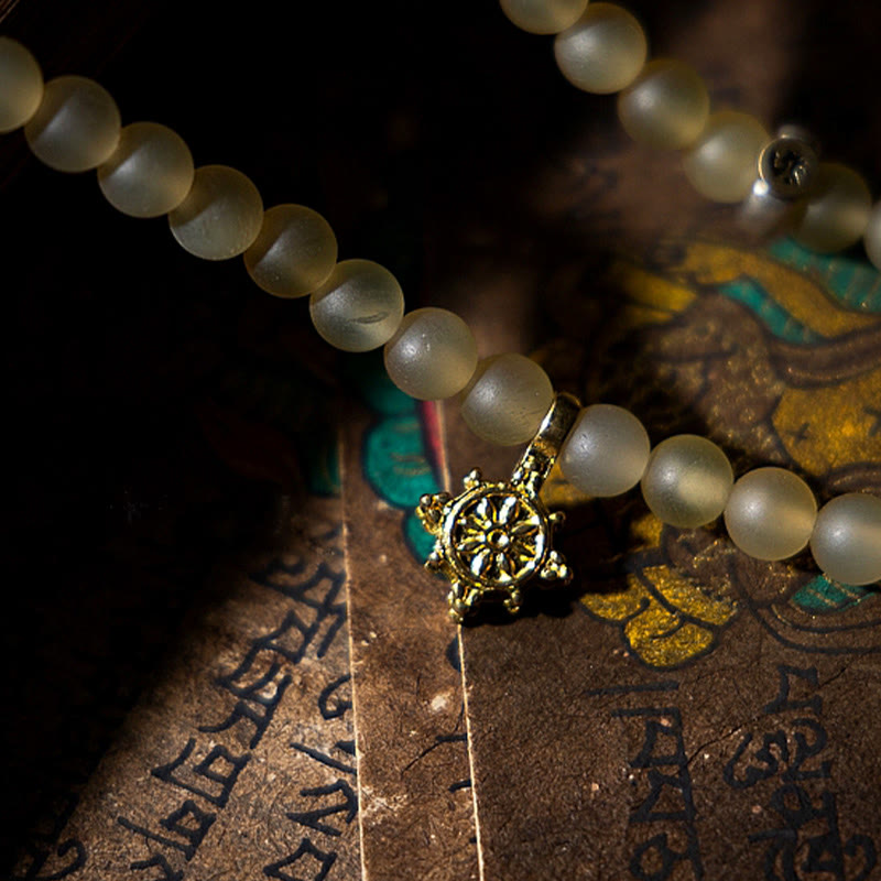 Bracelet de richesse en corne de mouton naturelle Bouddha du zodiaque chinois avec 108 perles de Mala en Buddha Stones du Tibet