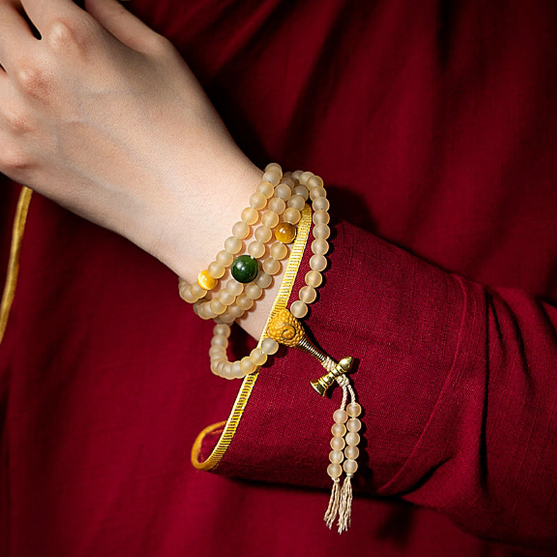 Bracelet de richesse en corne de mouton naturelle Bouddha du zodiaque chinois avec 108 perles de Mala en Buddha Stones du Tibet