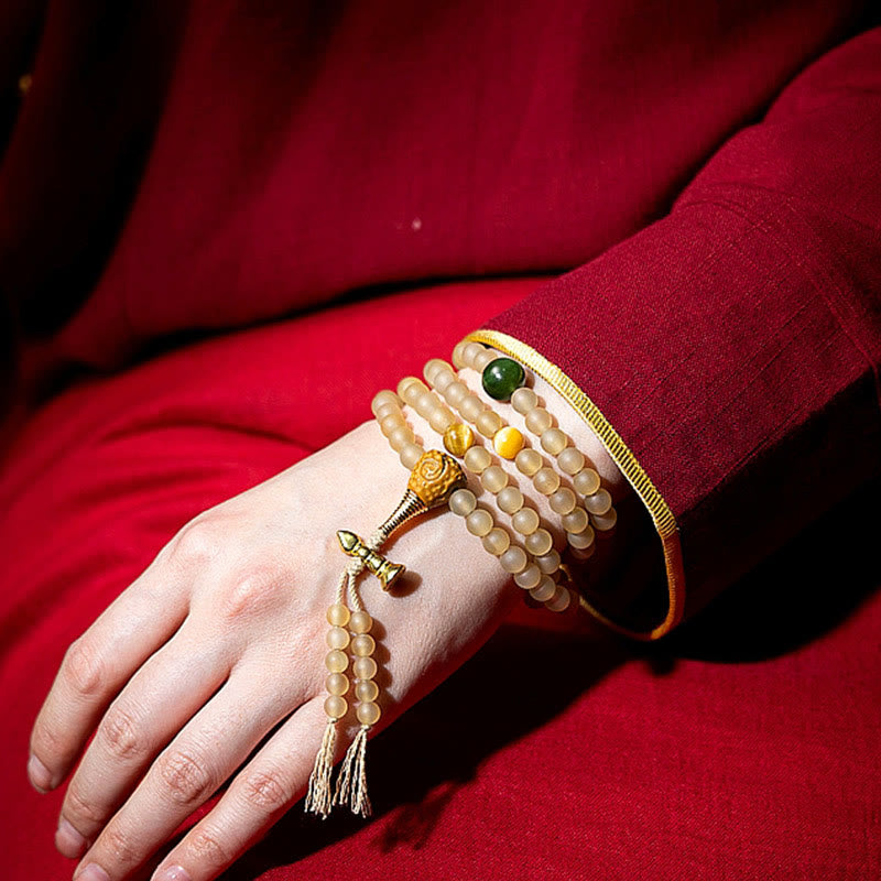 Bracelet de richesse en corne de mouton naturelle Bouddha du zodiaque chinois avec 108 perles de Mala en Buddha Stones du Tibet