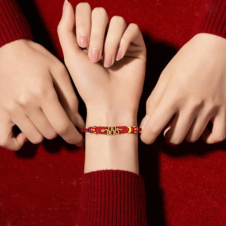 Bracelet tressé de protection à huit fils avec Buddha Stones et nœud de paix rouge Année du serpent