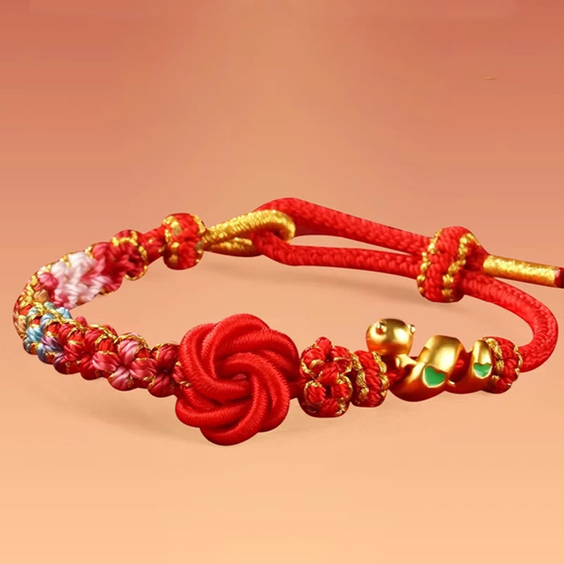 Bracelet tressé de protection de l'année du serpent avec Buddha Stones mandala en fil rouge tissé à la main avec fleurs colorées