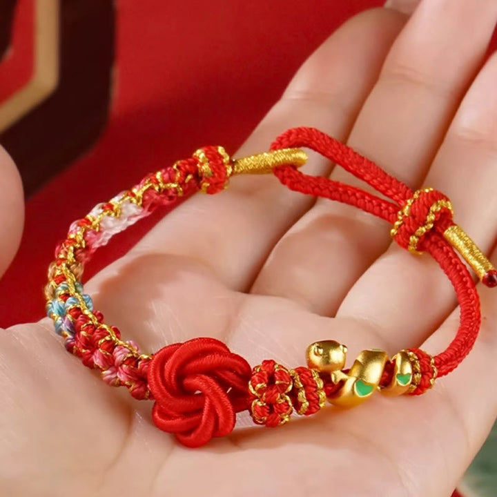 Bracelet tressé de protection de l'année du serpent avec Buddha Stones mandala en fil rouge tissé à la main avec fleurs colorées