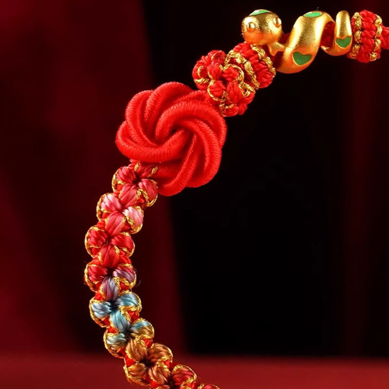 Bracelet tressé de protection de l'année du serpent avec Buddha Stones mandala en fil rouge tissé à la main avec fleurs colorées