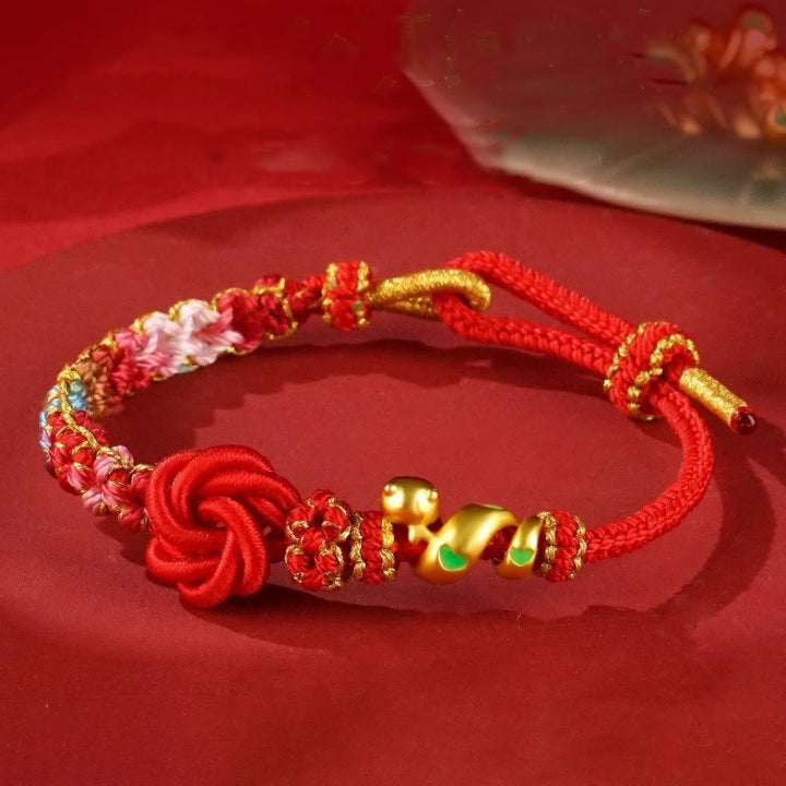 Bracelet tressé de protection de l'année du serpent avec Buddha Stones mandala en fil rouge tissé à la main avec fleurs colorées